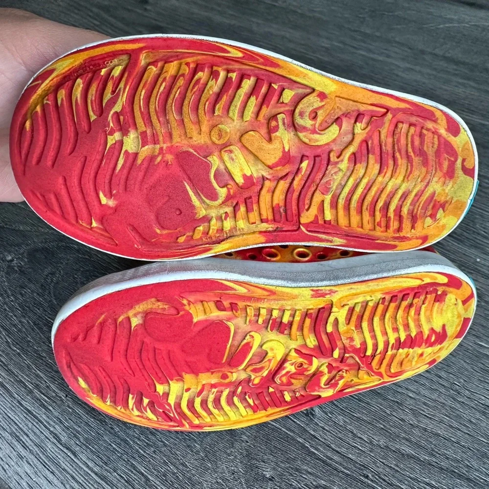Unisex Native Shoes - yellow and orange tie-dye slip-on sneakers